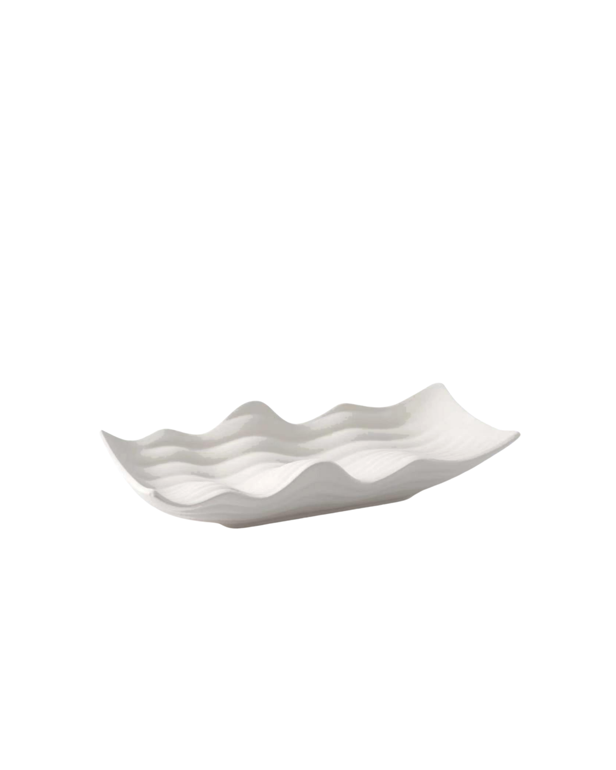 Waverly Bowl by Ned Collections, a long ivory porcelain bowl with rippling wave edges, on a white background