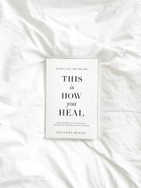 Brianna Wiest book When You’re Ready, This Is How You Heal styled on white linen bedding; self-growth and healing guide.