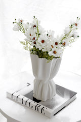 Realistic white cosmos faux flower bunch arranged in sculptural 3d printed white vase