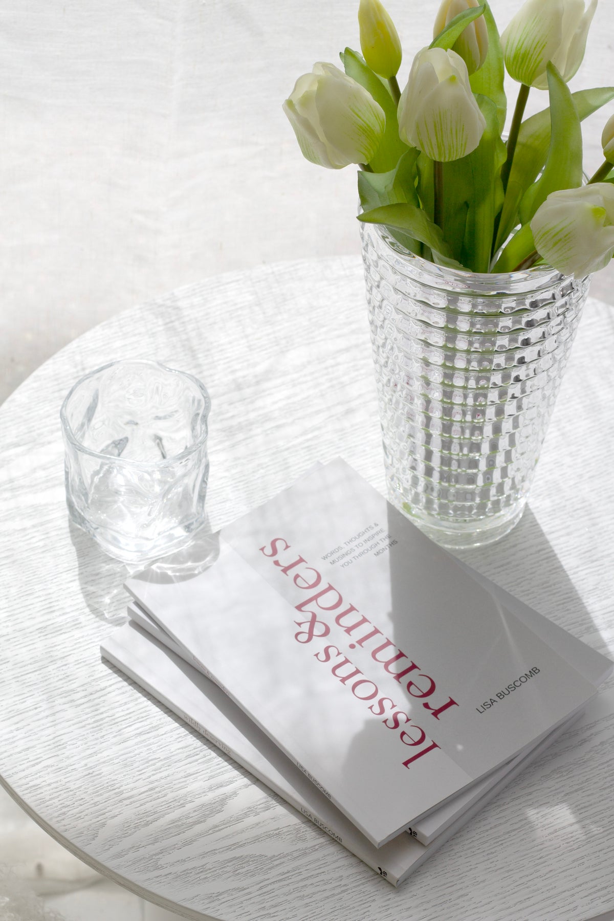 Wilde Road Lessons & Reminders 12-month guide by Lisa Buscomb, keepsake reflection book styled on a nightstand