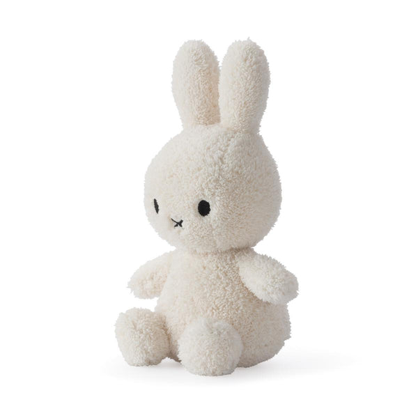 A Miffy Sitting Terry Cream (23cm) plush bunny sitting on a white background by Mr Maria.