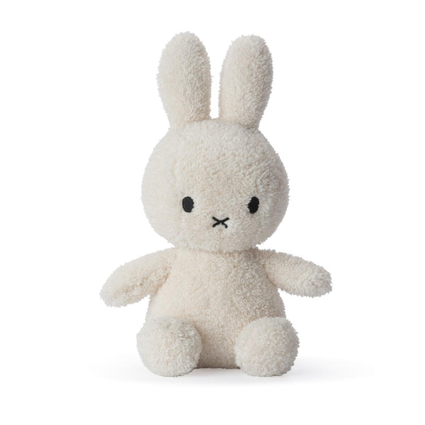 A Miffy Sitting Terry Cream (23cm) plush bunny by Mr Maria, sitting on a soft white background.