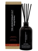 Opulent Mandarin, Mint & Basil aroma in a Therapy® Kitchen Diffuser by The Aromatherapy Co, in a black box.