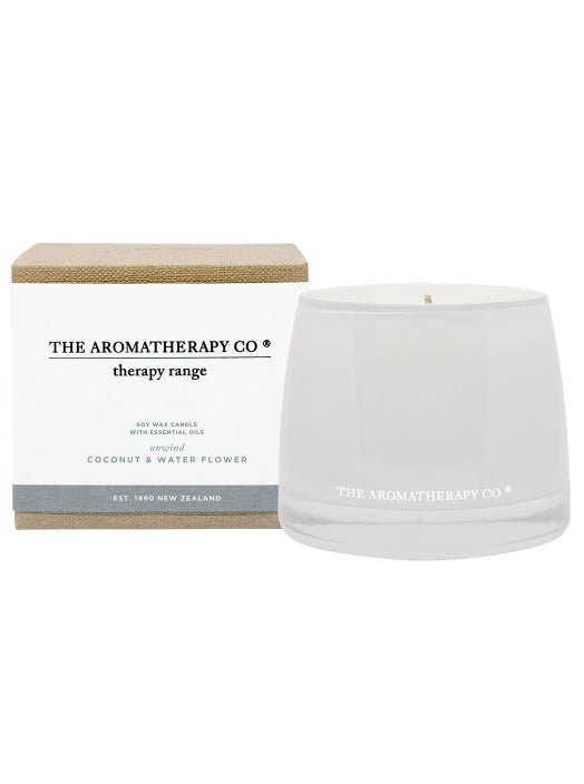 The Therapy® Candle Unwind - Coconut & Water Flower by The Aromatherapy Co is a soothing and marine inspired product.