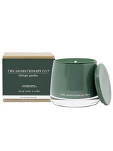 The Therapy® Garden Candle - Wild Lime & Mint from The Aromatherapy Co provides a botanical aroma.