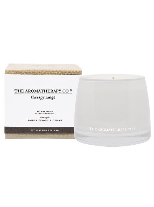 The Therapy® Candle Strength - Sandalwood & Cedar by The Aromatherapy Co is made with a Soy Wax Blend. Infused with the refreshing scents of Cedar and Sandalwood, this candle creates a calming atmosphere for ultimate relaxation.