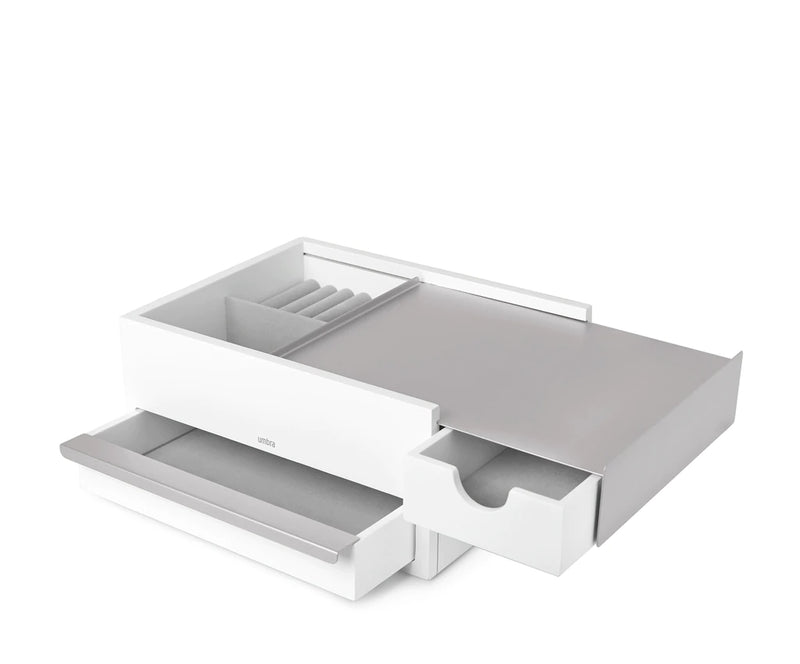 A white STOWIT JEWELRY BOX WHT/NKL by Umbra with two drawers open on a white surface, functioning as a storage drawer or jewelry box.