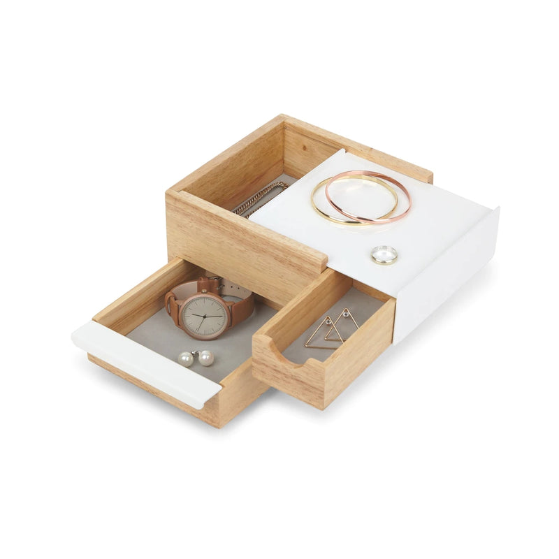 An Umbra MINI STOWIT JEWELRY BOX NATURAL/WHITE with compartments to store wooden jewelry.