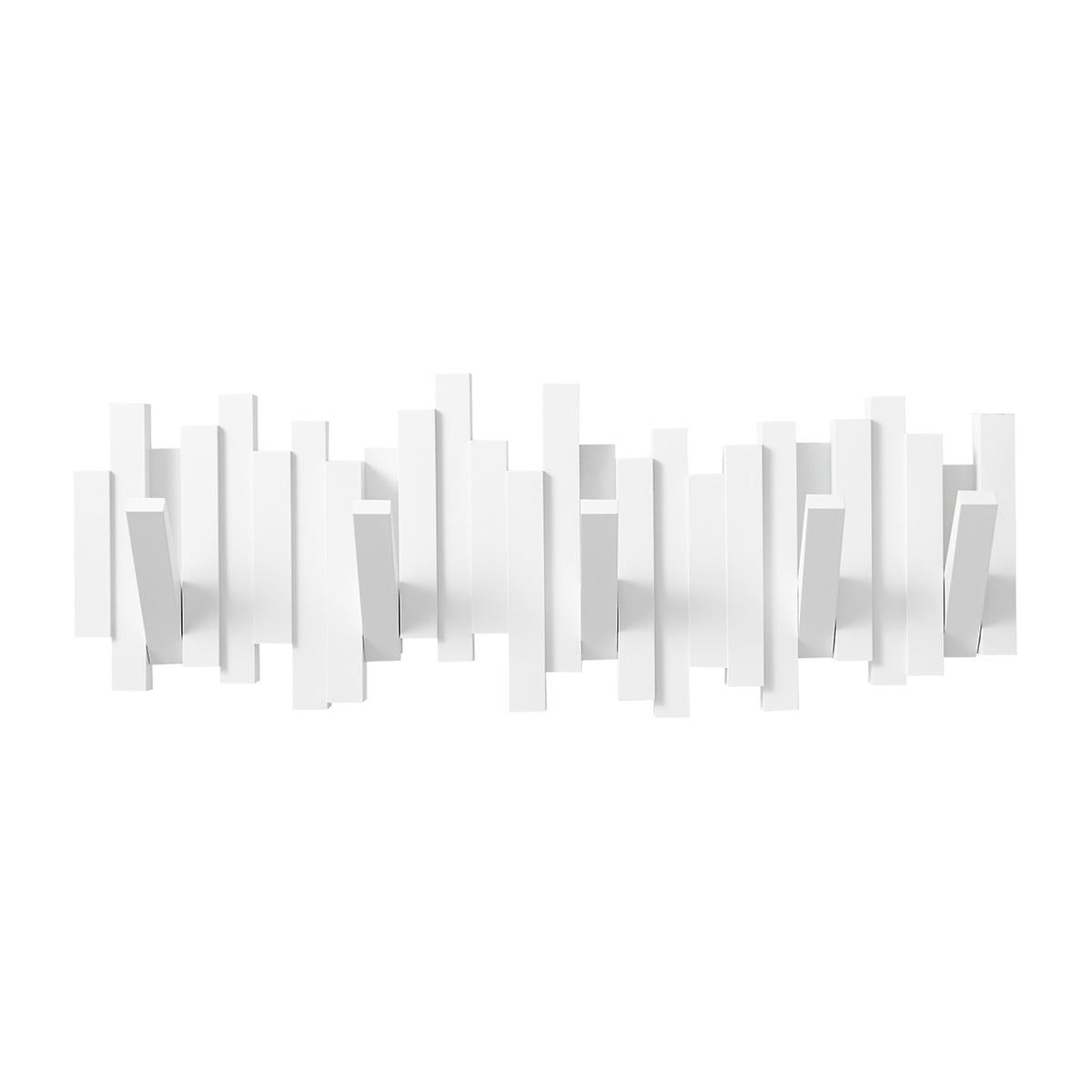 Umbra Sticks white multi hook wall rack mounted in an entryway