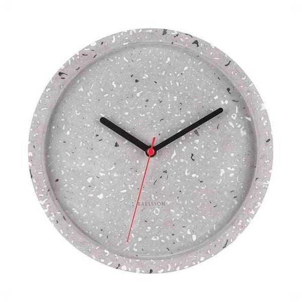 The Tom Terrazzo Wall Clock (26cm) by Karlsson features a white background and a striking red clock face, complementing any interior design. Powered by a reliable quartz movement, this clock keeps accurate time while adding