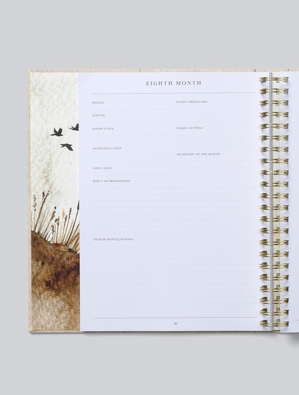 A gift baby journal with a bird on it for capturing your first five years.