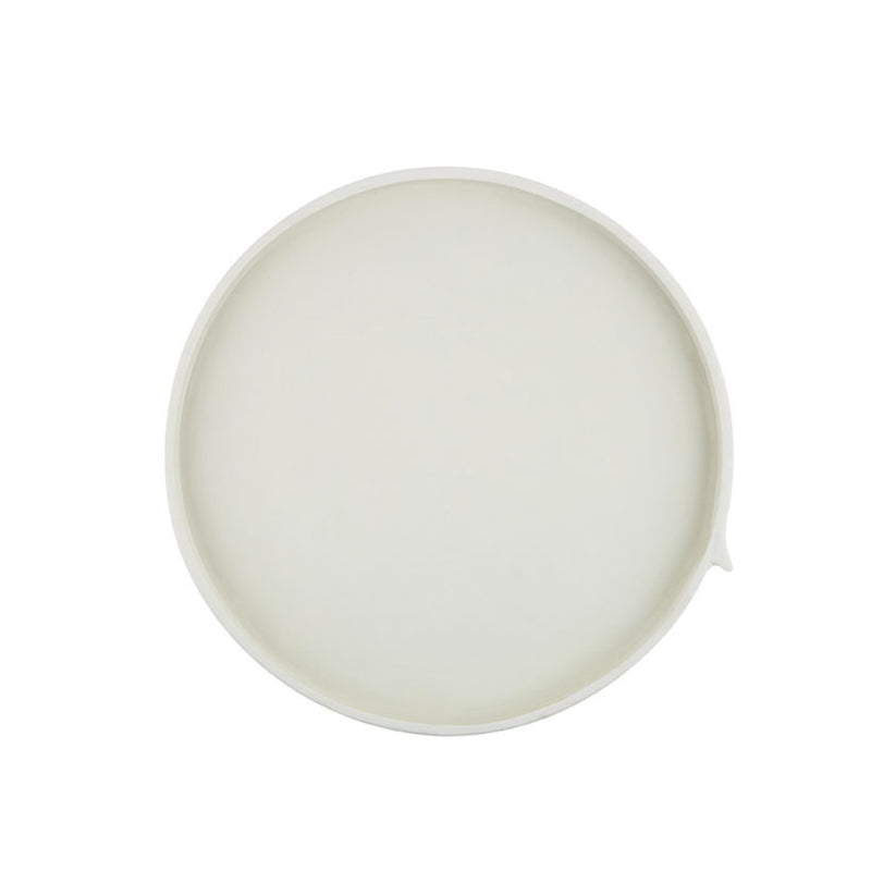 A Burlap Round Tray - Large White by Zakkia on a white surface.