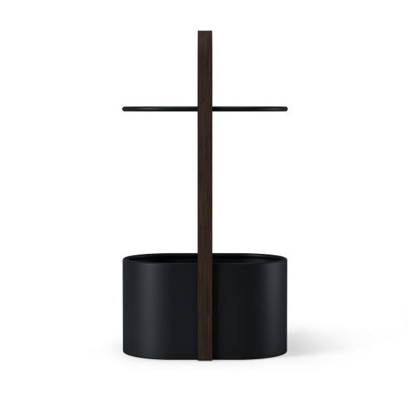 Umbra Bellwood storage table in black and walnut from behind, tabletop edge-on above the bin