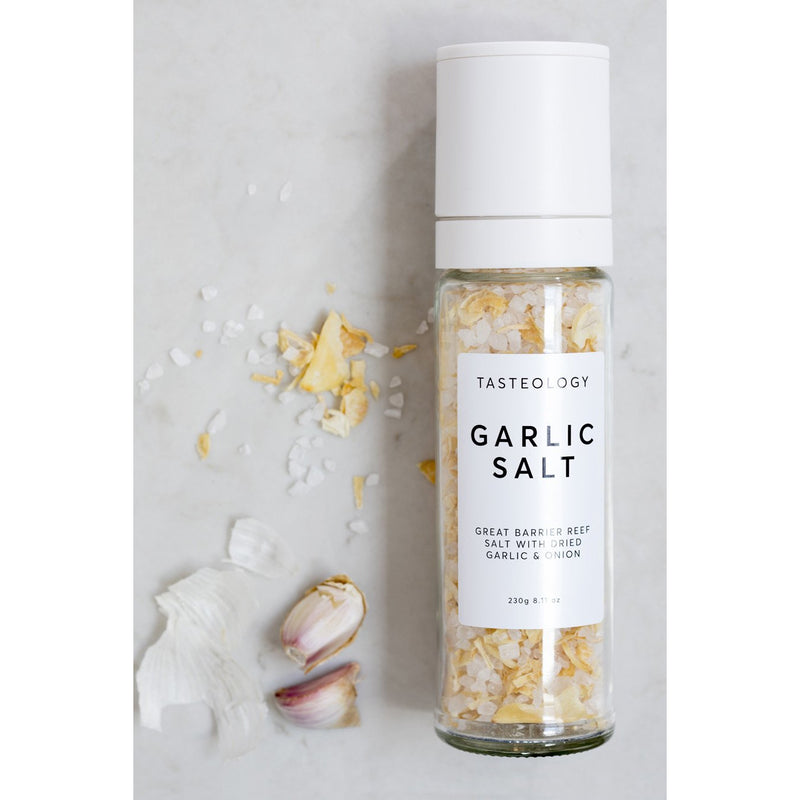 A bottle of Tasteology Great Barrier Reef Garlic Salt on a white surface.