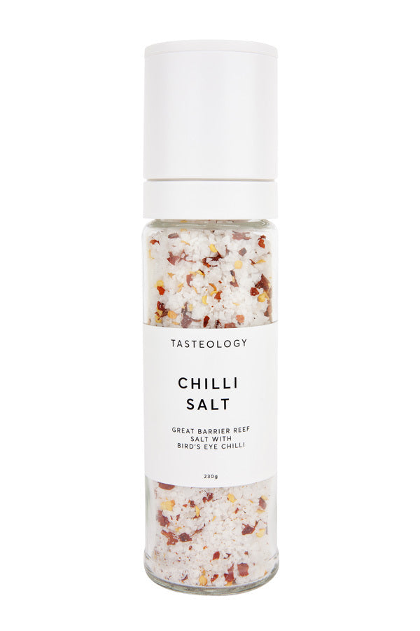 Tasteology Chilli Salt, ideal for oriental dishes, presented in a jar on a white background.
