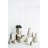 A group of Carved Vase Rounded - Confetti vases by Zakkia on a white background.