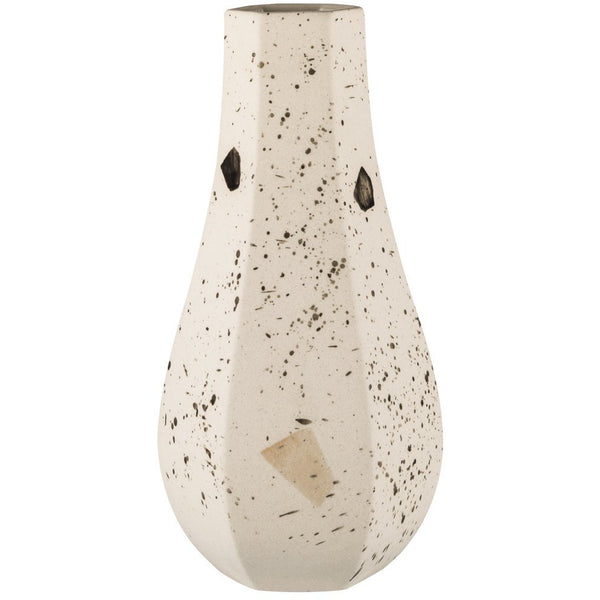 A Zakkia Carved Vase Curved - Confetti with speckles on it.