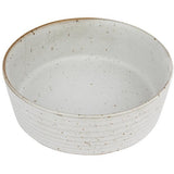 A Zakkia handmade Speckle Bowl - Large Seagrass on a white background.