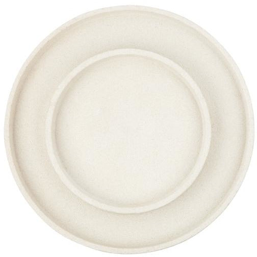 A Zakkia white plate on a Zakkia Concrete Round Tray - White.