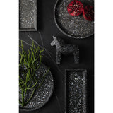 A black Terrazzo Square Tray - Black Seashell from Zakkia, with a horse and pomegranate, perfect for bathroom settings.