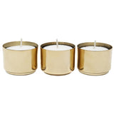 Three Zakkia brass tealight candle holders on a white background.