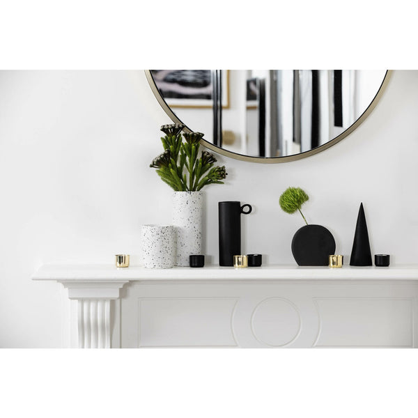A Zakkia-inspired black and white mantel adorned with vases and a mirror, along with a sleek Zakkia silver tealight candle holder - Set of 3 Silver.