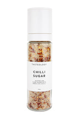 A jar of sustainable Tasteology Chilli Cane Sugar on a white background.
