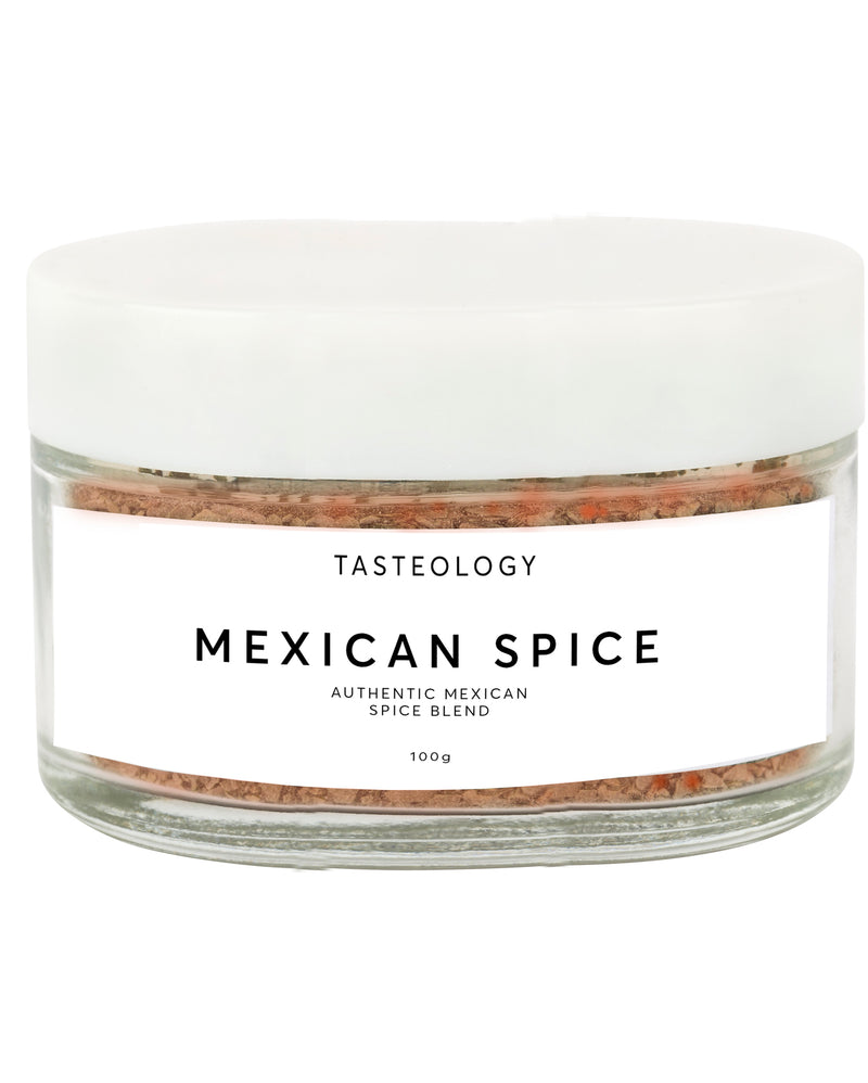 A jar of Tasteology Mexican Spice on a white background.