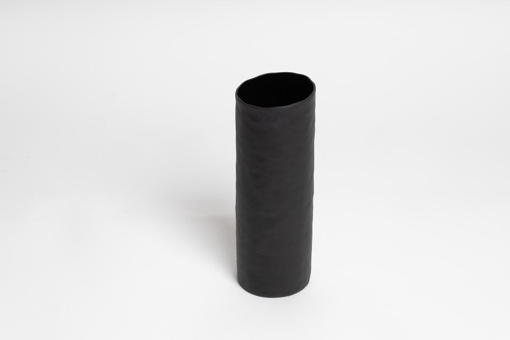 The Bernie Vase - Various Options from Ned Collections sits elegantly on a white background, its matte finish accentuating its sleek black design.