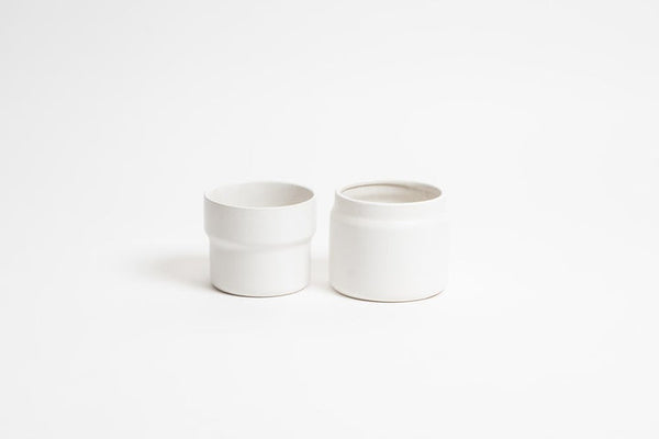 Two Eldi Pots on a white surface from Ned Collections.