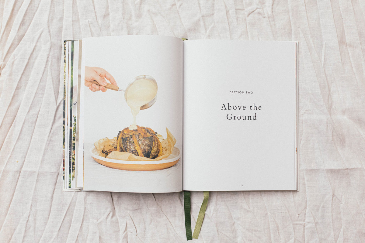 A Salad book with a picture of a person pouring milk into a bowl.