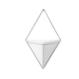 A white triangle hanging planter, also known as a Umbra Trigg Wall Vessel | Large - White/Nickel, serving as a decorative vessel for indoor plants on a white wall.