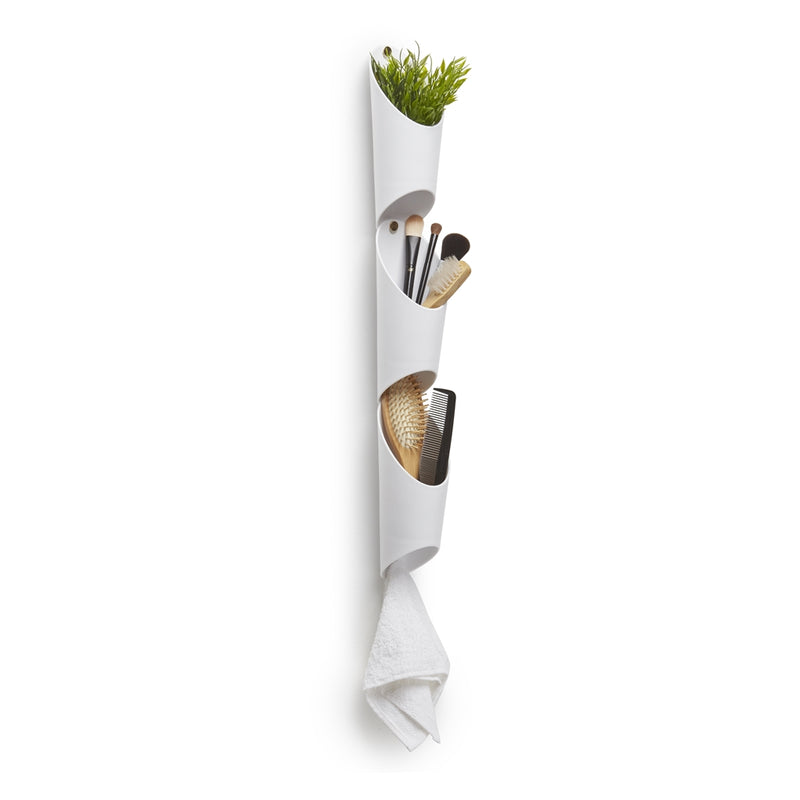 A white Floralink wall mounted shelf adorned with a plant hanging from it, featuring the modern and stylish Umbra range.