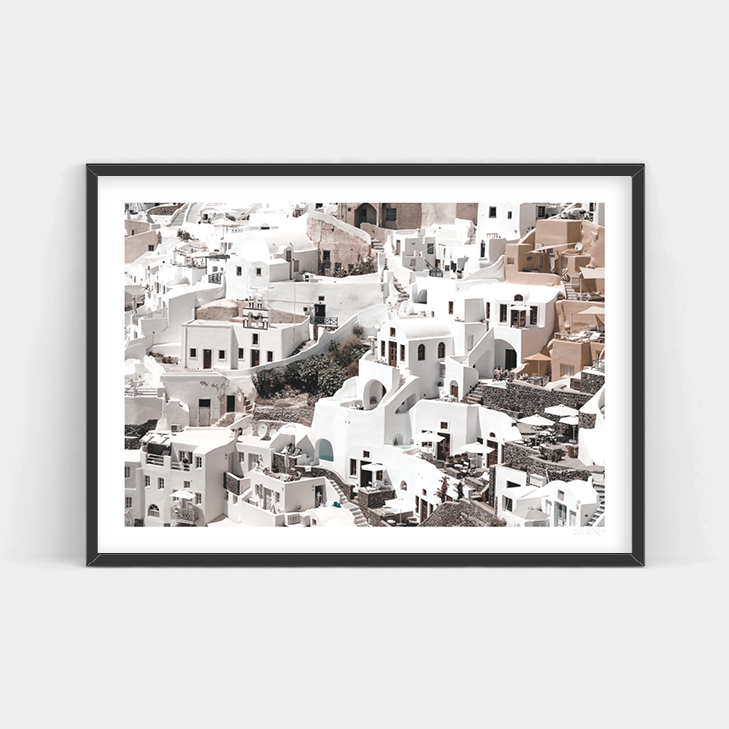 A black and white photo of a town in Santorini, available for purchase as Santorini framed prints with convenient delivery from Art Prints.