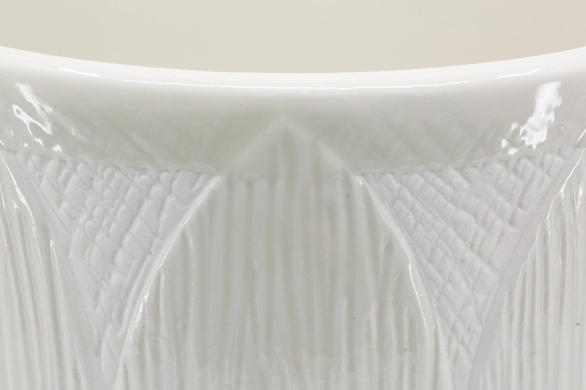 A close up of a Zakkia Kapok Pot - Set of 3 - White with a pattern on it.