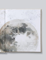 A Write To Me journal filled with memories spanning 21 years, adorned with a watercolor painting of the moon.