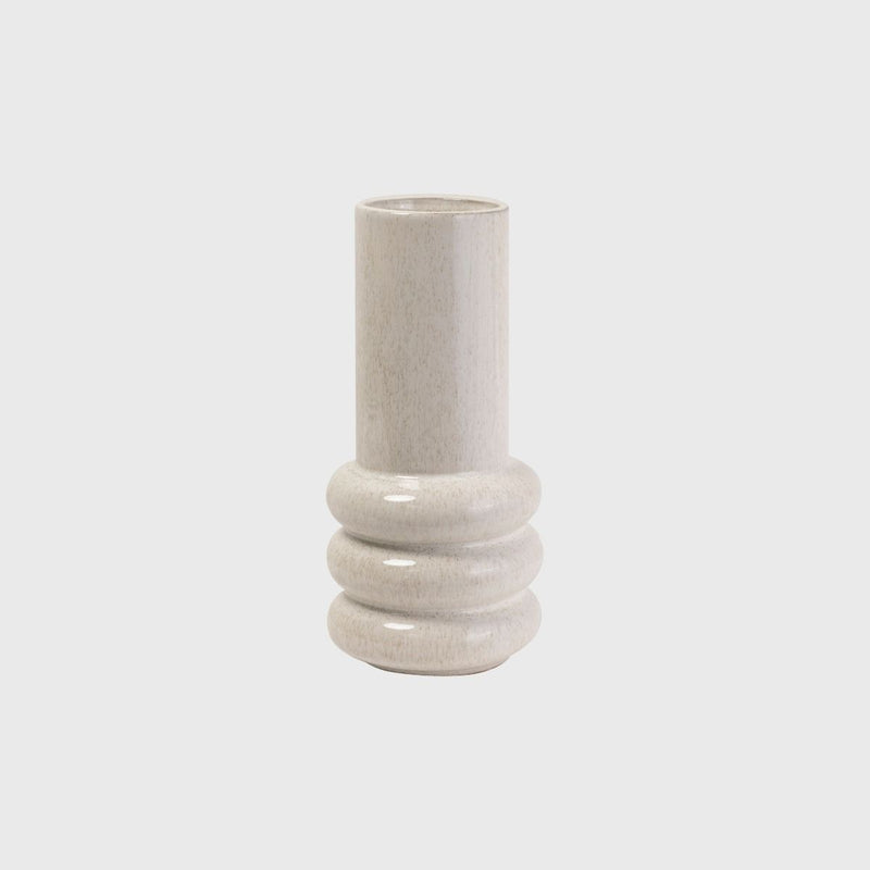The Potted Milan Vase is a sleek décor statement, featuring a white vase on a white background.