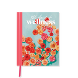 A pink Scandinavian notebook with the words "365 Days of Wellness" by Collective Hub on it.