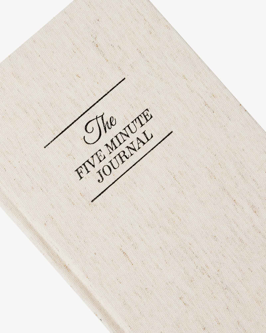 Close view of the embossed title on the linen cover