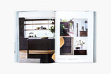 A HARE + KLEIN INTERIOR | Meryl Hare book with pictures of a kitchen and a living room.