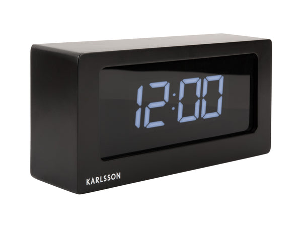 A Scandinavian clock with the word Karlsson on it.