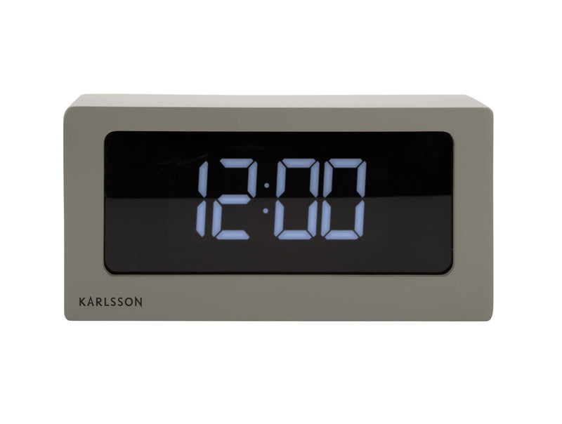 A Scandinavian-designed Karlsson clock with a digital display on a white background.