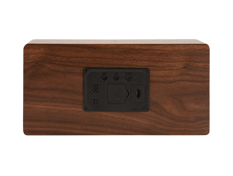 A sleek Karlsson Boxed LED wooden box with a black button on it perfect as a bedside table.