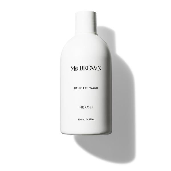 A bottle of Ms Brown DELICATE WASH cleansing liquid on a white background.