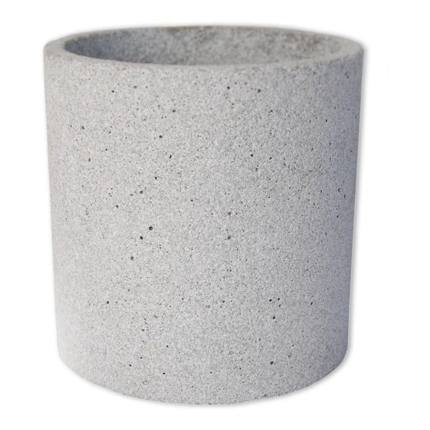 Small concrete plant pot styled in a coastal Scandi-Japandi living space