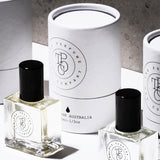 Three bottles of The Perfume Oil Collection Gift Set - Fresh by The Perfume Oil Company sitting next to each other on a white surface.