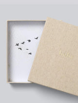 A baby diary gift box with a drawing of birds, called BABY | YOUR FIRST FIVE YEARS by Write To Me.