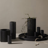 A collection of Zakkia's Burlap Vase - Small Black in a minimalist design.