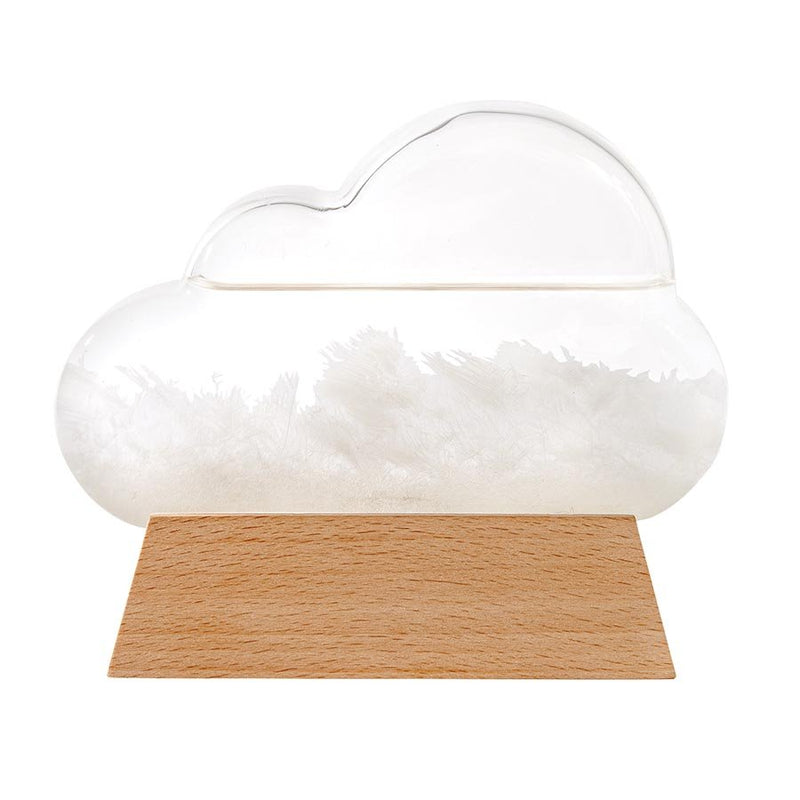 An Albi Cloud Weather Station on a wooden base, depicting atmospheric fluctuations.