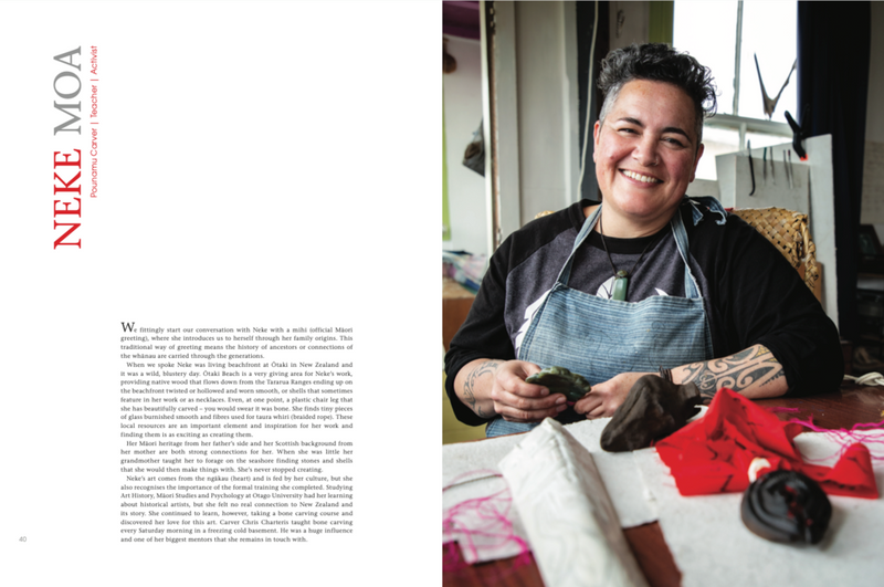 A woman is smiling while holding the book "Spirit | Conversations With Creative Women", showcasing the creativity and design skills of New Zealand women creatives.